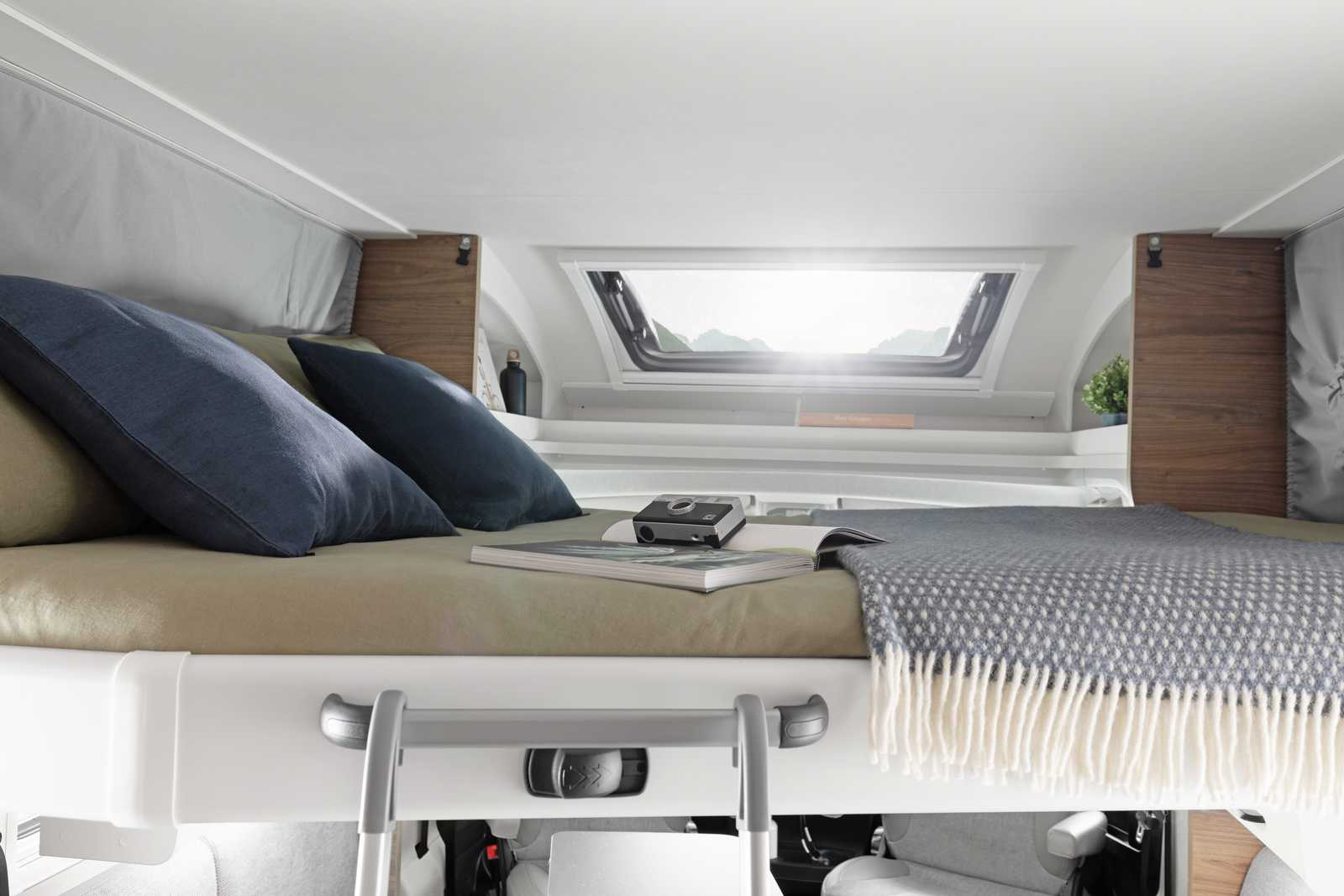 Corigon Pure T 75 LQ. En option (1715 €), un lit de pavillon peut être installé au-dessus du salon. Celui-ci présente des dimensions de 140/113 x 193 cm.
